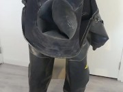 Putting on heavy rubber Viking drysuit, gasmask, latex mask and condom