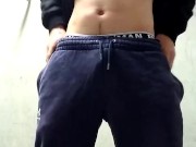 Horny lad pulls down trackies and shows off his hard coclk