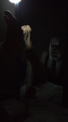 Feet in mirror