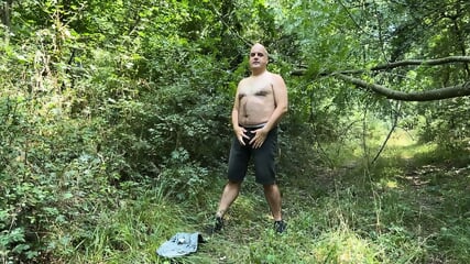 Zolee undresses in the forest and then cums