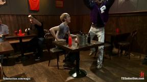 ”T-girl fucks men in sports bar”