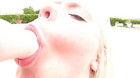 Sexy blonde in fishnet masturbating outdoors