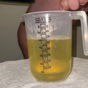 Huge piss and massive cumshot in cup