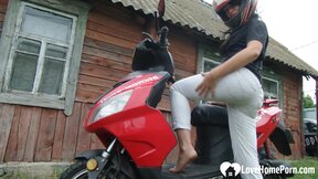 Biker chick masturbates on her red motorcycle