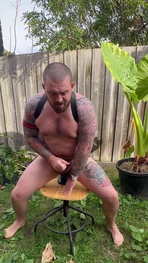 Stud Rides Dildos in the Backyard