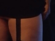 Crossdressing locked in chastity with buttplug in