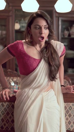Indian actress in a red sari