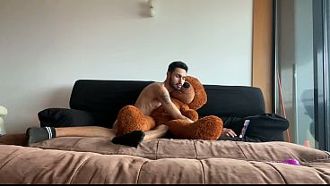 Skinny, big-cocked twink jerking off with his teddy bear while playing video games.