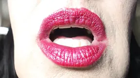 Red lipped temptress gags on long cock