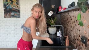 Blonde washes her hair right in the living room! (w)