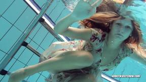 ”Beautifully dressed underwater babe Lucy Gurchenko”
