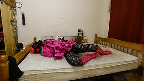 Self-bondage in chastity with CD maid armbinder and gas mask