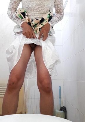 Urine and Sperm Flow Wetting the Satin Skirt of a Crossdresser