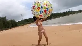 Naive Yuri Hamada plays ball on the beach looking great
