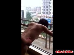 Asian Girl Shared at Open Window