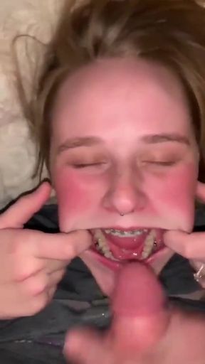 Amateur braces girl takes a deep cum shot