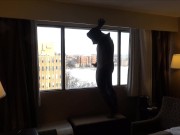 wetsuited masked horny guy comes onto hotel room window