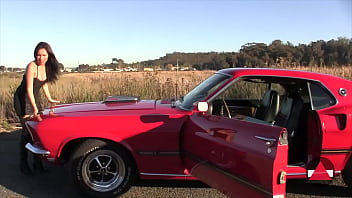 Boot Pumping in Red 69 Mustang Classic makes her orgasm outside