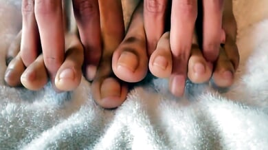Viva Athena, tattooed brunette, teases her feet with clear nails in solo fetish play