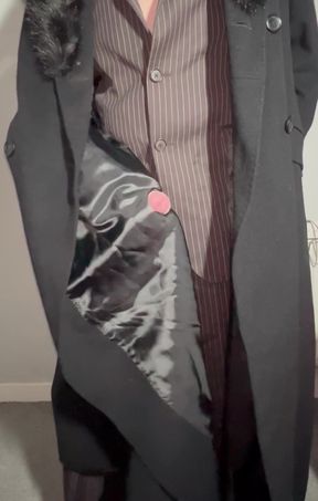 Sissy playing with cock in a ladies long coat and suit stroking myself with the lining of my coat
