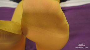 Mistress feet tease in yellow nylons
