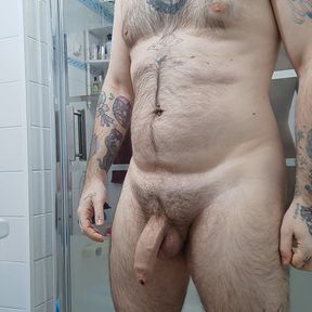 Hairy man masturbates before shower