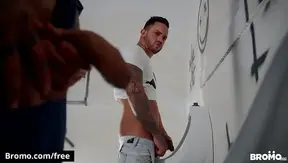 Tattooed Hunks Engage in Intense Urinal Sex in Public Restroom