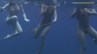 Underwater swimming girls on Tenerife