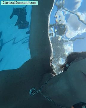 Carissa swimming nude in the pool set to music