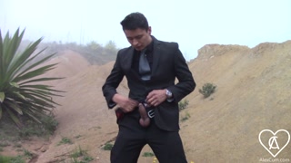 Young Man Sneaks Out of the Office to Outdoors