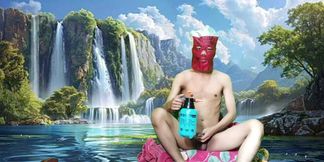 Masturbating with a dildo made from a bottle, used under a waterfall.