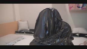 Cat doll in plastic bag