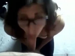 Cute girl with glasses sucks dick