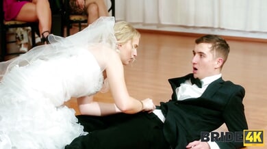 Czech blonde bride in lace stockings cheats on her groom during the wedding reception while a guest secretly watches from the doorway