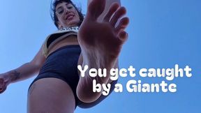 You're caught by a Giant Girl