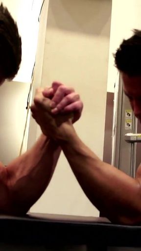 Amateur Fitness Guys Arm Wrestle in the Gym