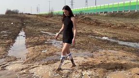 White socks in mud, knee high socks in mud, nylon socks in mud, girl walking in mud, socks stuck in mud