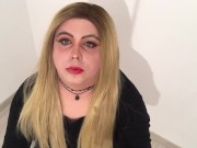 Blonde sissy smokes a cigarette and plays with cock in chastity