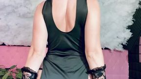 Quietly pleasuring herself in tights and a sexy black dress