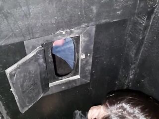 pair sucking dongs at Gloryhole at swing party