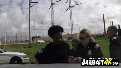 Black dude tries to scape from to two horny cops that want to fuck him hard outdoors at a park.