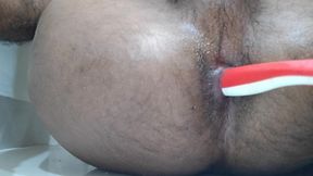 Anal brushing cumshot