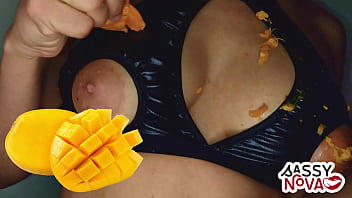 Sexy Girl Playing With Mango