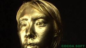 The first pregnant woman in the gold paint