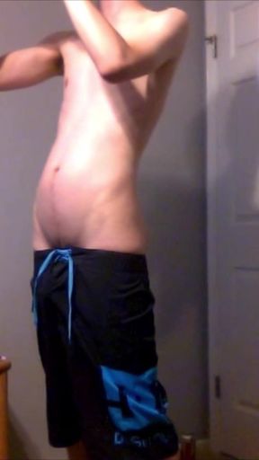 Young Guy Fills His Stomach with Water