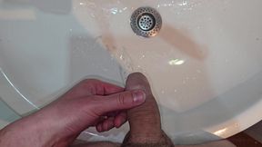 Pissing to the Bathroom Sink