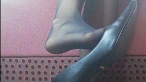 Beautiful shoeplay teasing with high heels and showing soles and toes