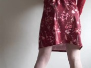 Sissy in permanent chastity cage under long skirt
