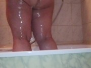 I caught my stepmom in the shower washing and massaging her big ass and her chubby shaved pussy