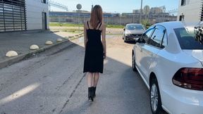 A girl in ankle-high boots walks through deep muddy puddles and a lot of muddy water flows into her boots